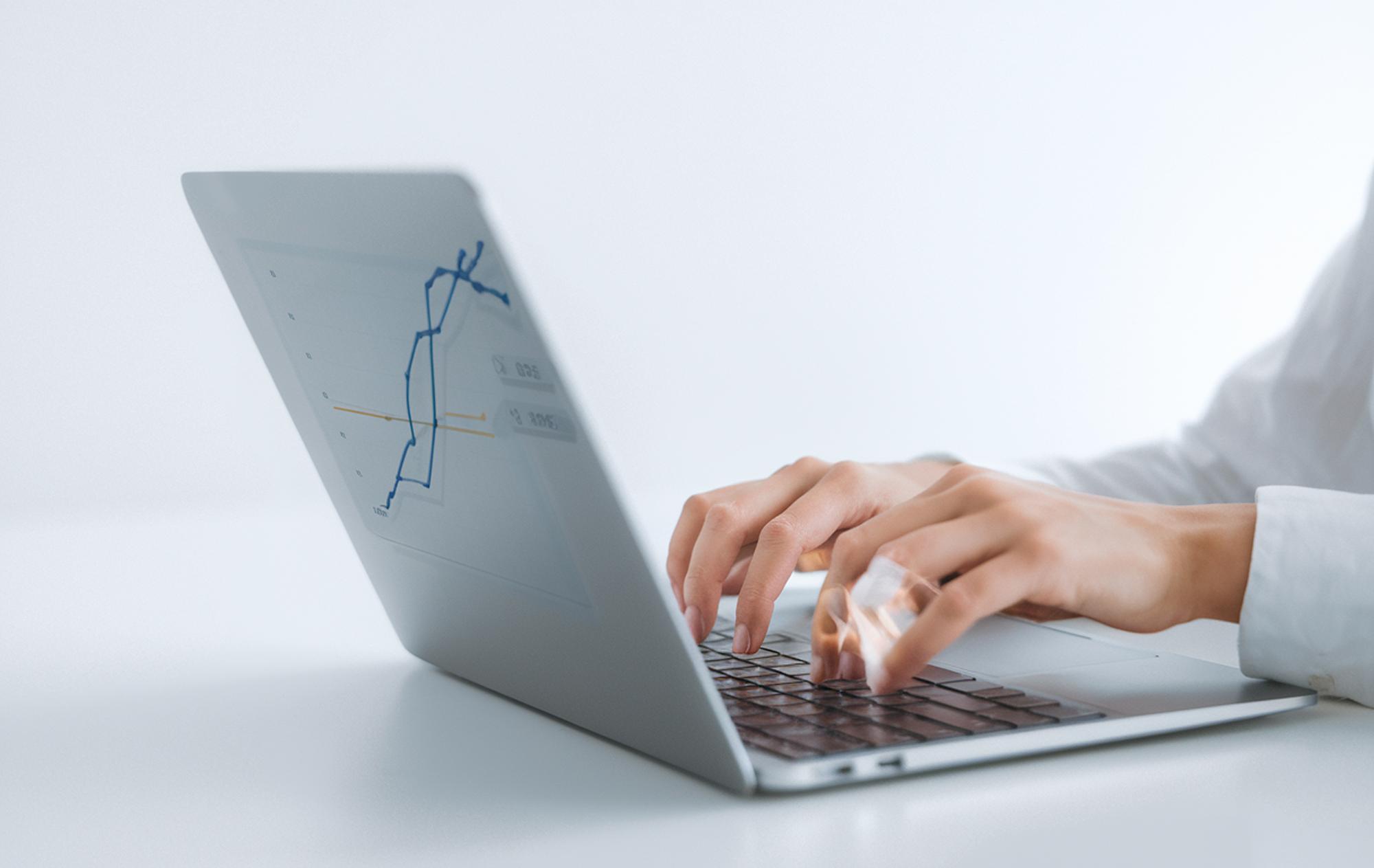 Close-up of financial chart on laptop